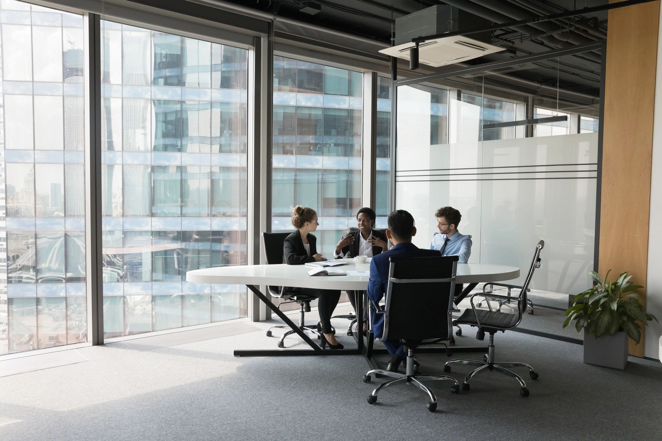 Business team discussing a project in a meeting room