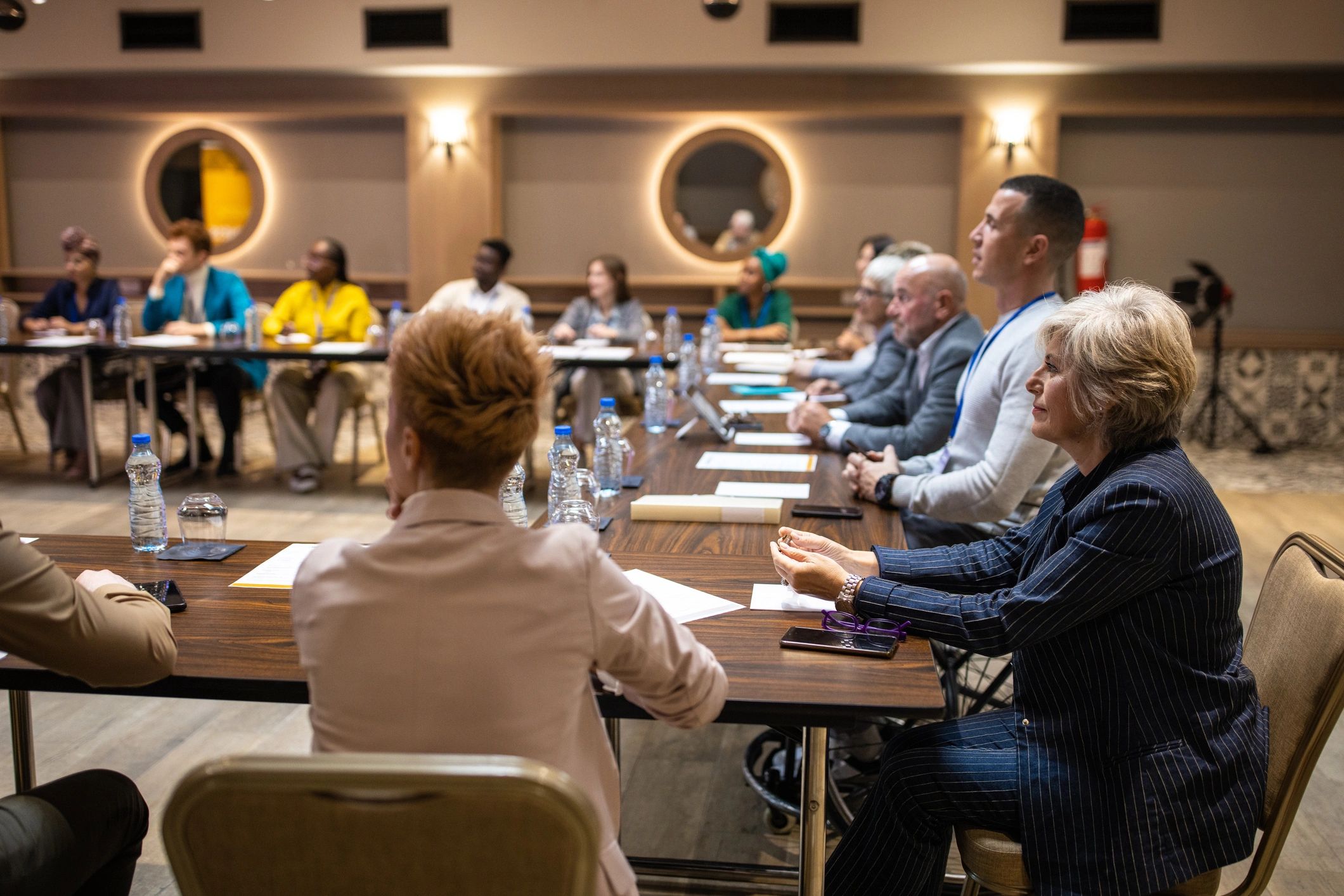 Business conference participants listening during a professional presentation