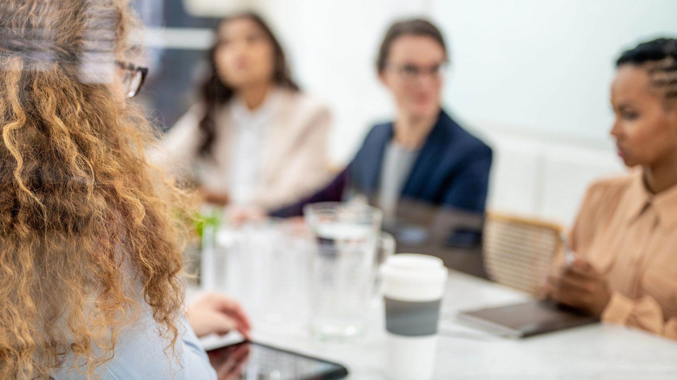 Colleagues collaborating during a strategy briefing