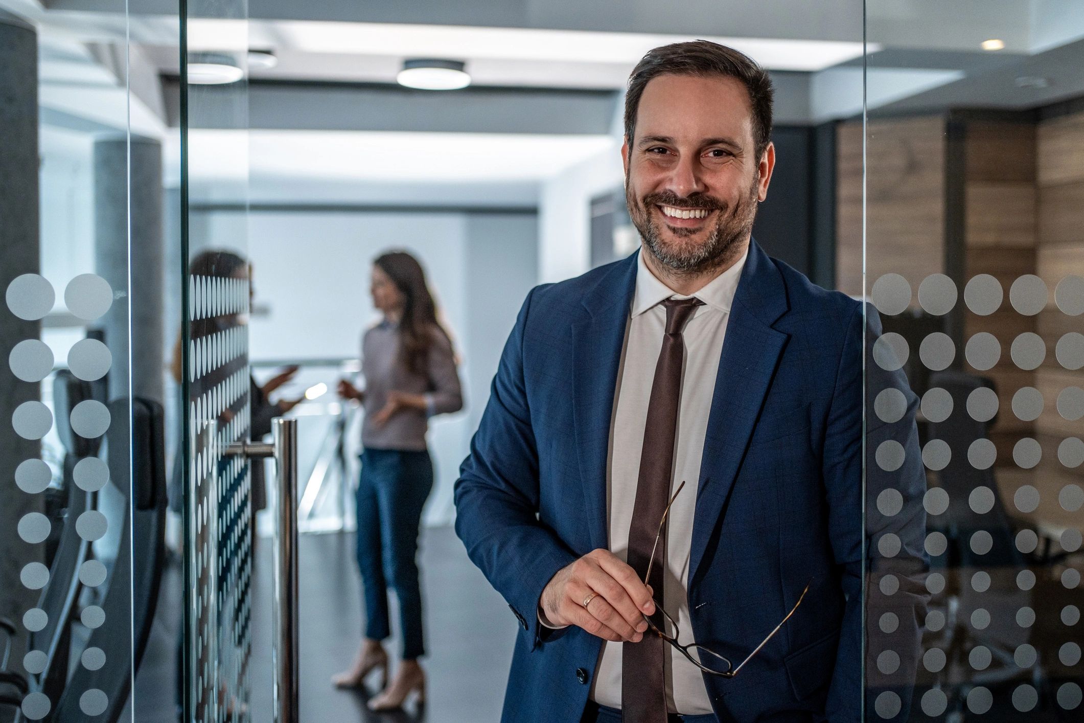 Professional consultant standing in an office