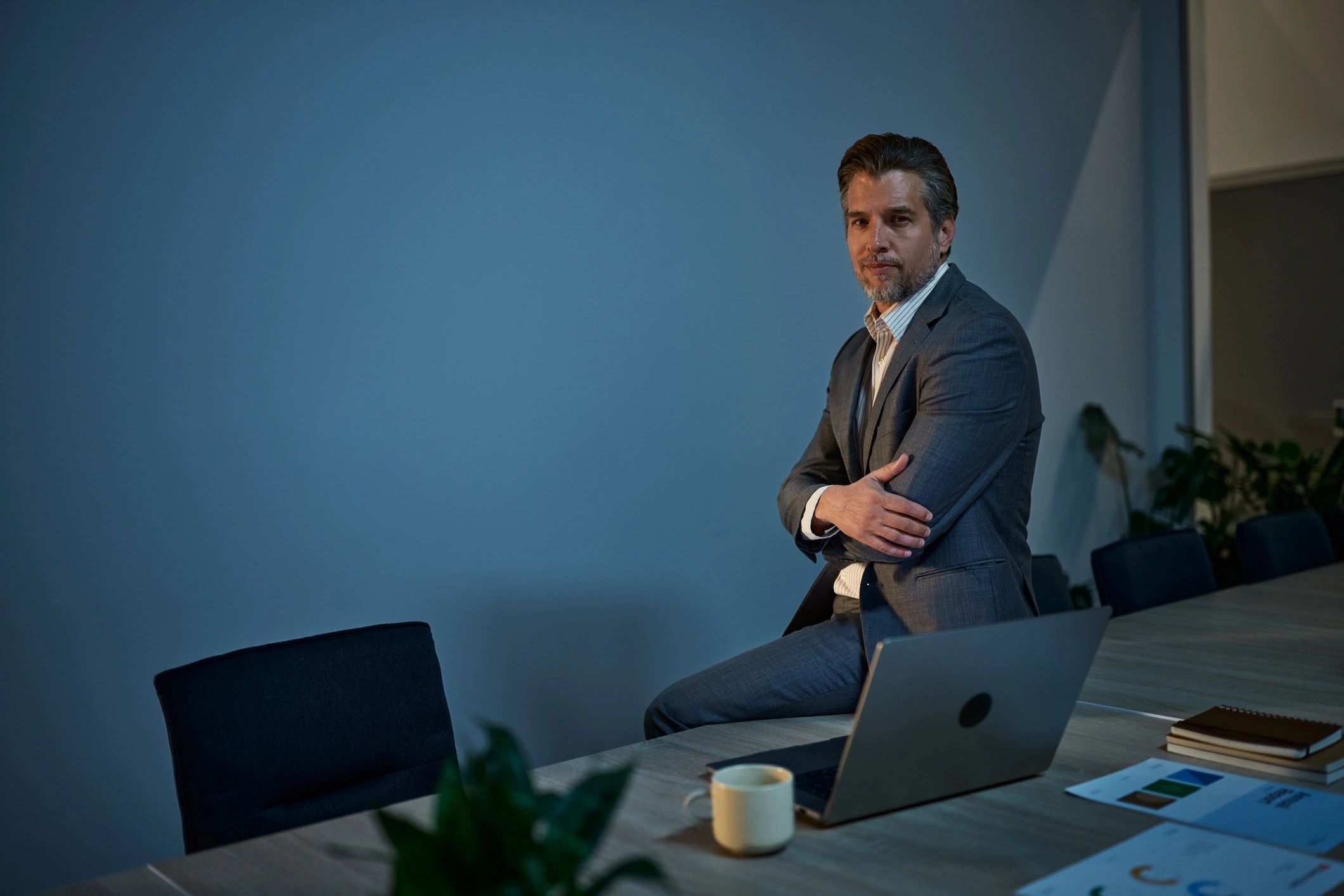Consultant reviewing documents in a modern office